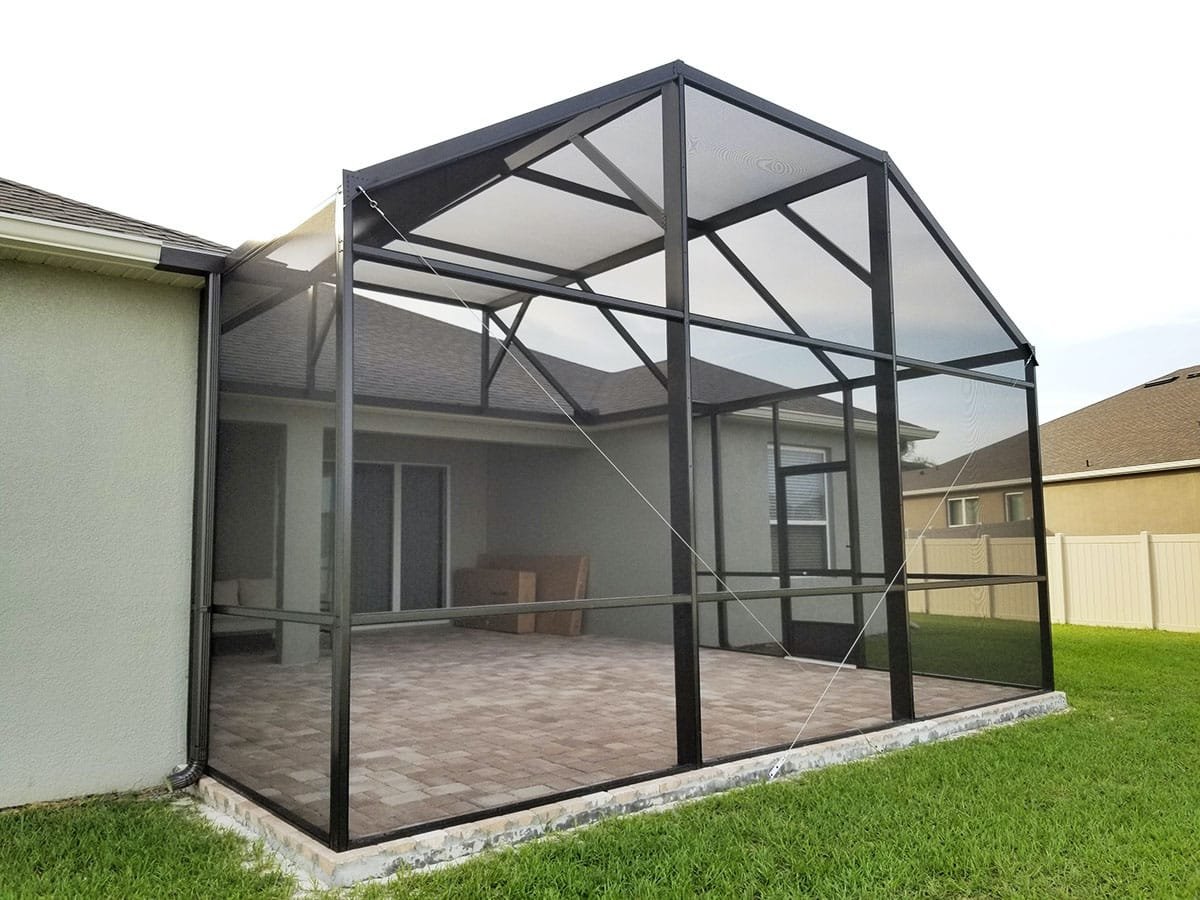 Aluminum lanai screen enclosure installation in Sebring, FL residential backyard