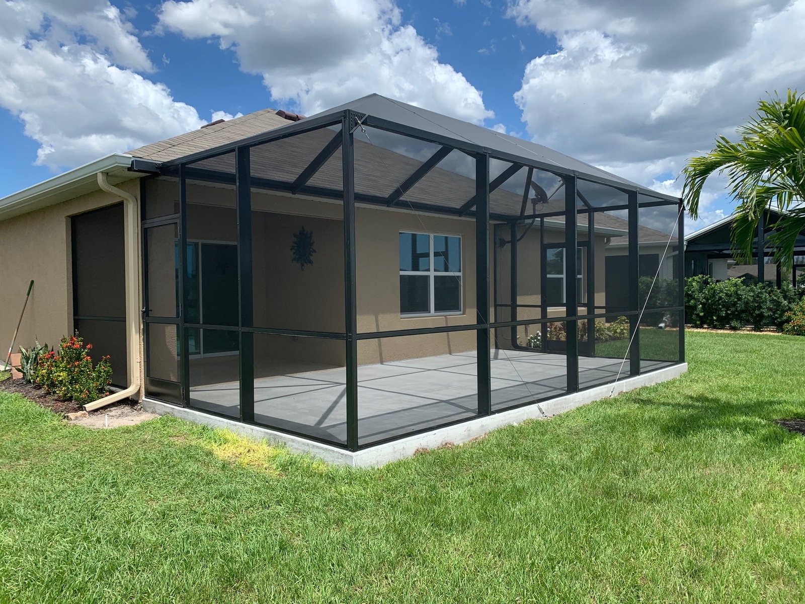 Completed patio enclosure installation in Sebring, FL residential backyard